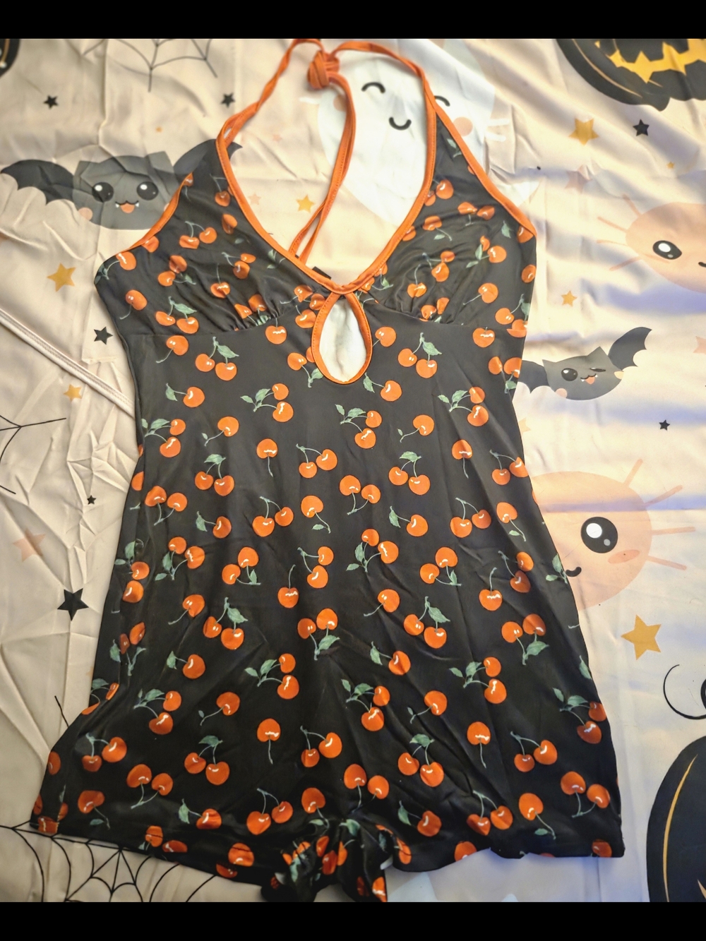 SHEIN Black Halter Romper with Orange Cherry Print
